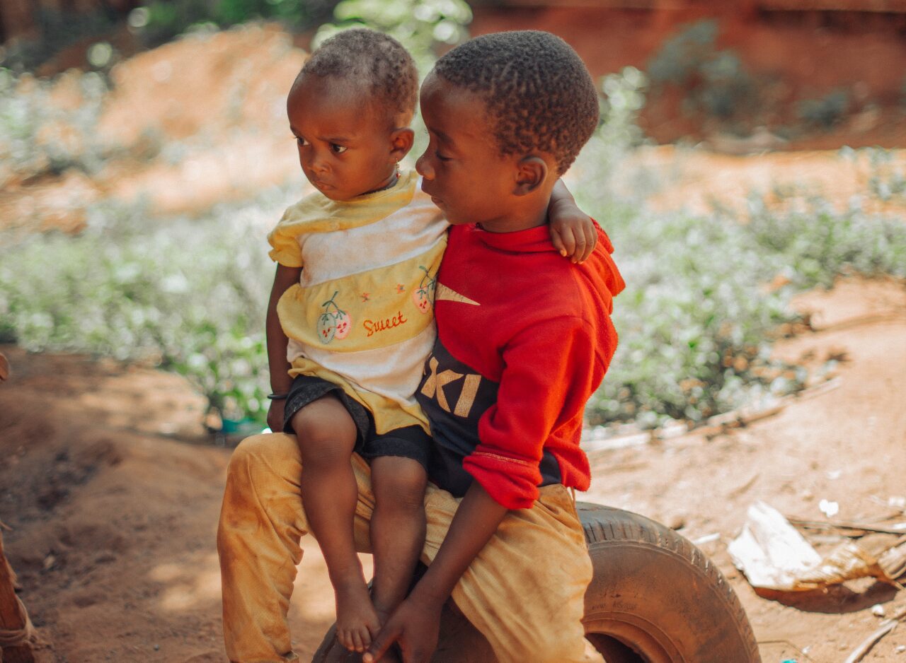Children playing outdoors in a traditional Zanzibar village