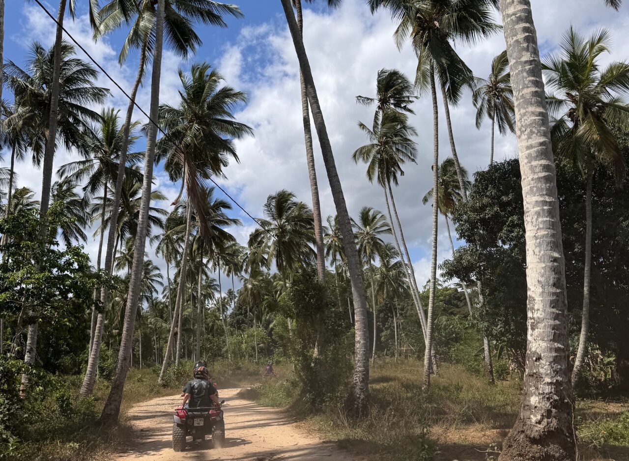 Visitors exploring rural Zanzibar on a quad bike tour